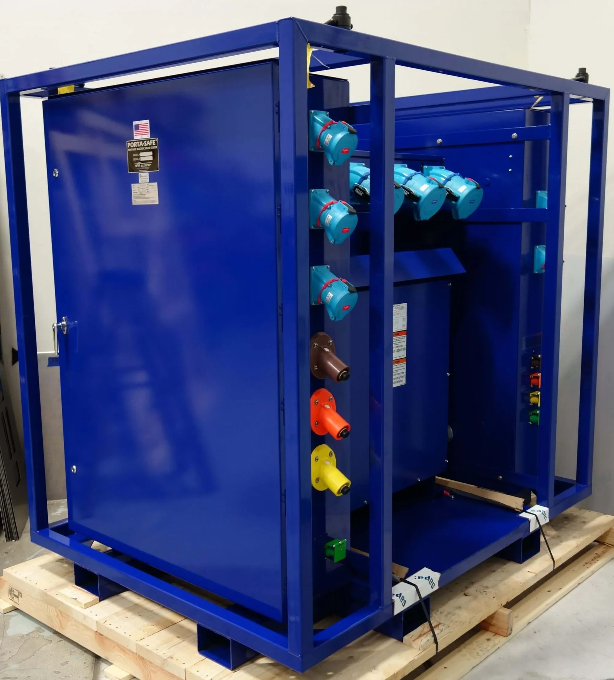 Blue Porta-Safe shipyard power distribution unit on a pallet, with lifting frame and fork slots
