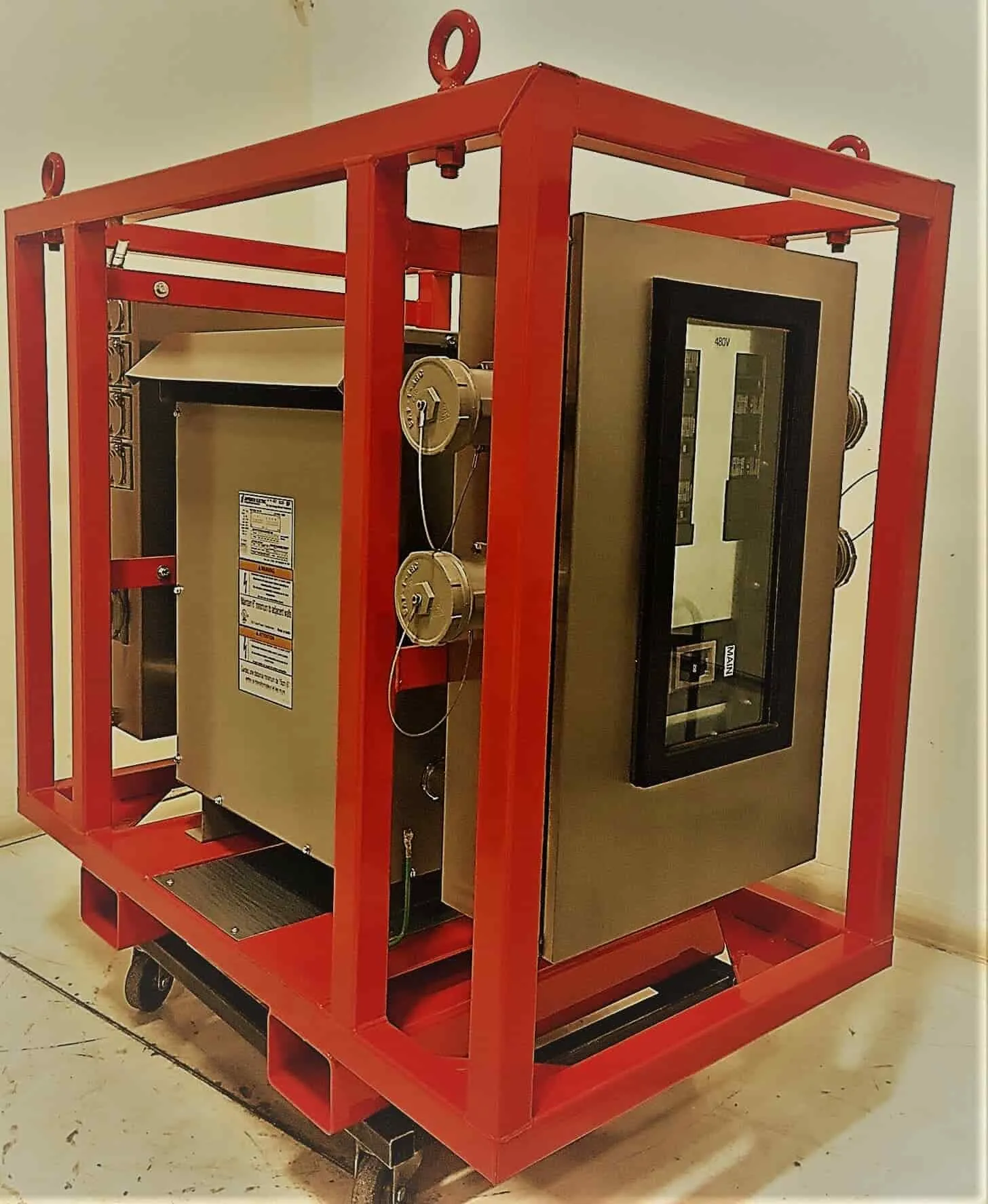 Skid-mounted Porta-Safe power distribution unit in a red frame with fork slots